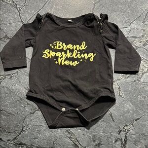 Black Baby Onesie with Gold Text